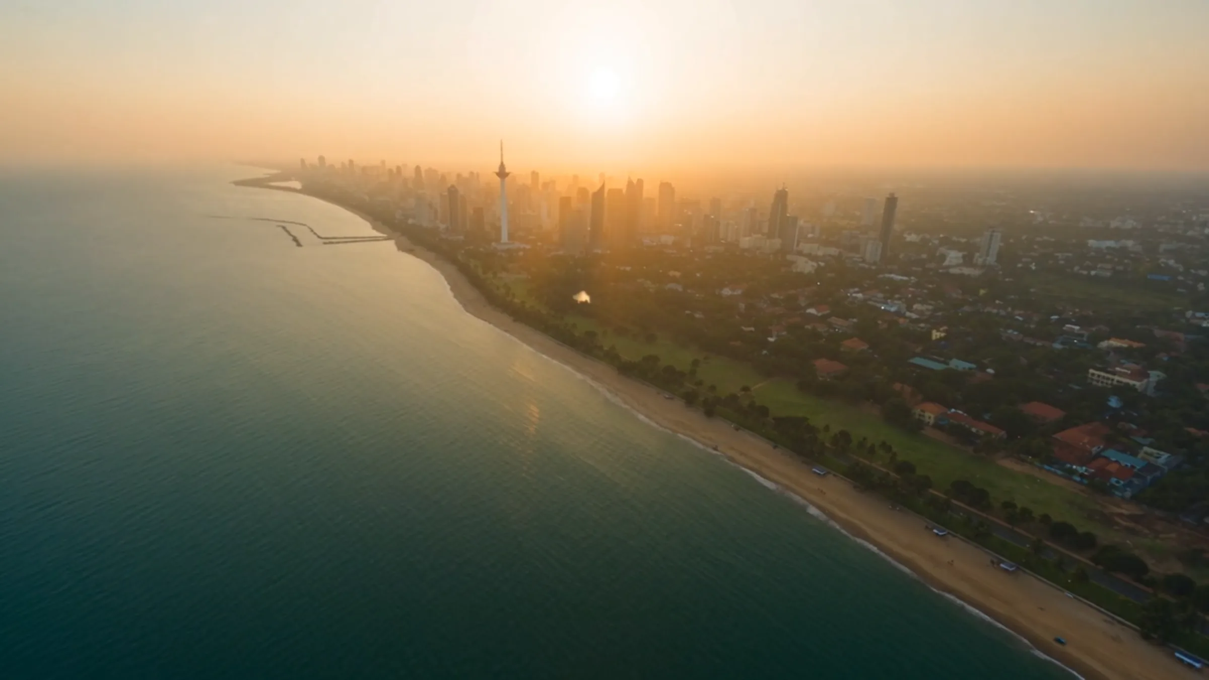 Colombo from the air: the Lotus Tower and the city skyline along Galle Face and the Indian Ocean